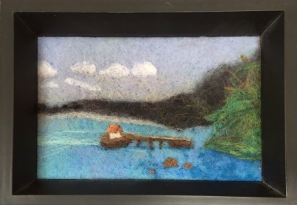 felted dock in lake landscape
